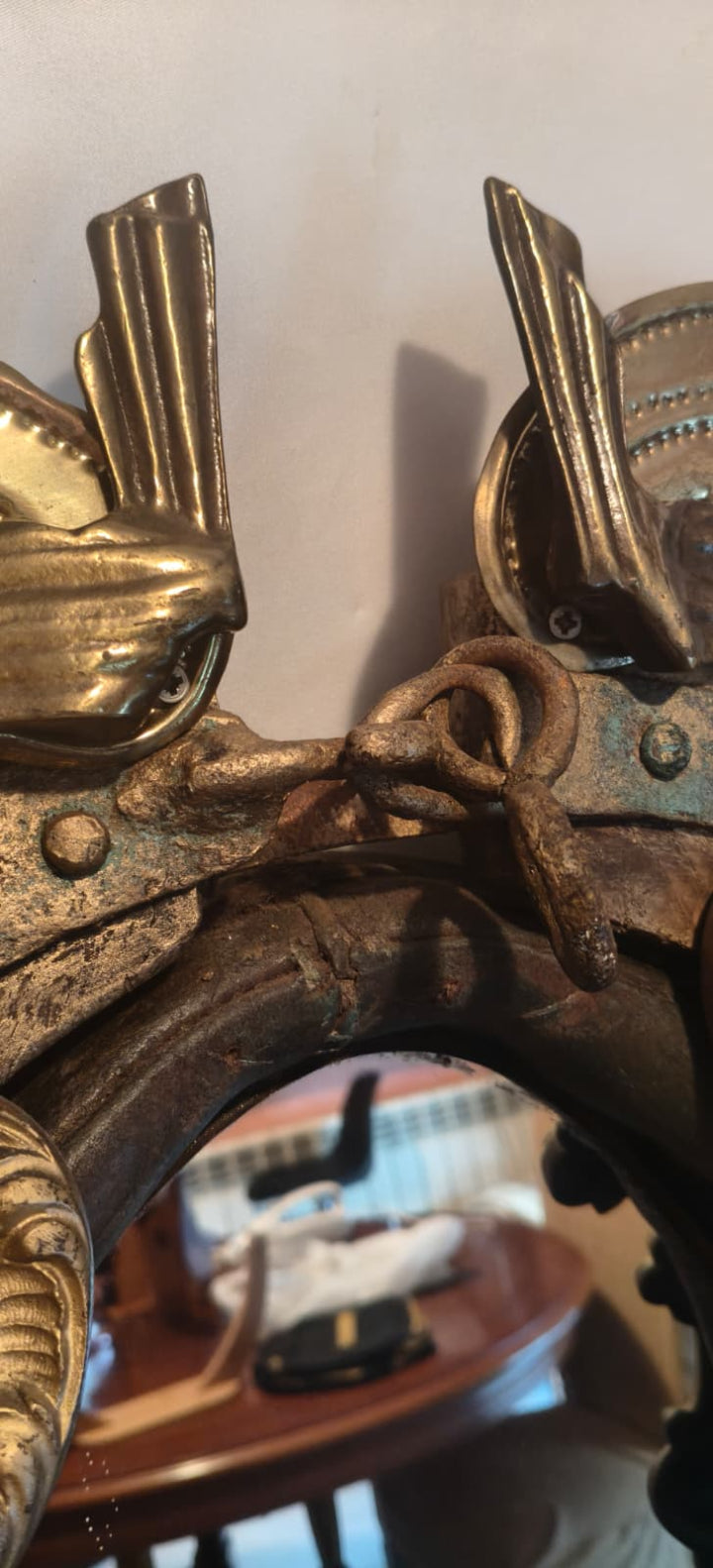 Transylvanian Ride mirror — upper section detail showing period cast metal mounts and patina