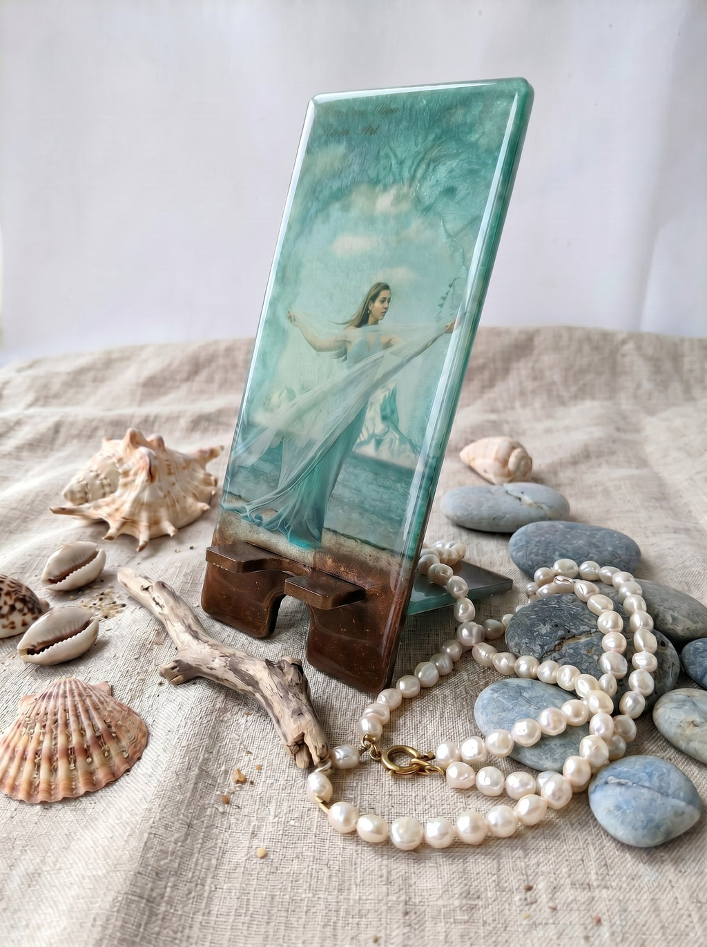 WickToria resin phone stand — lifestyle shot, personal photo desk organizer on resin base