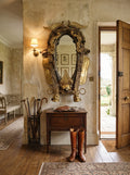 Antique Romanian horse-collar mirror with pressed metal mounts — full composition, statement piece